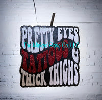 Pretty Eyes, Tattoos, & Thick Thighs